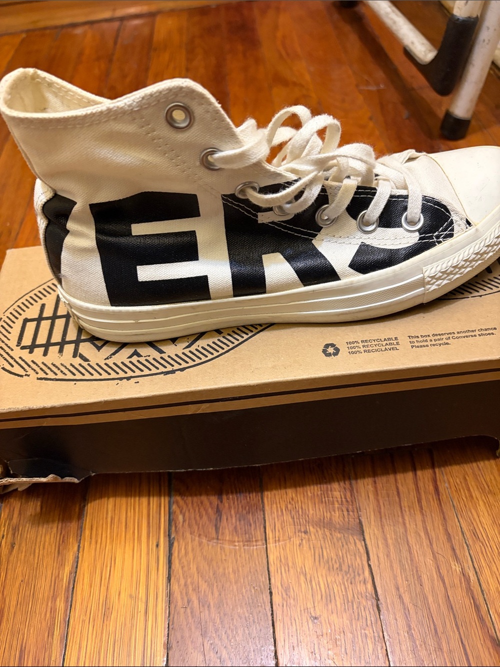 Converse women’s High-Top Canvas Sneakers in off white with Black Print